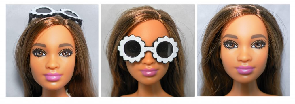 Close up details of her face with sunglasses as originally attached, being worn and sunglasses off